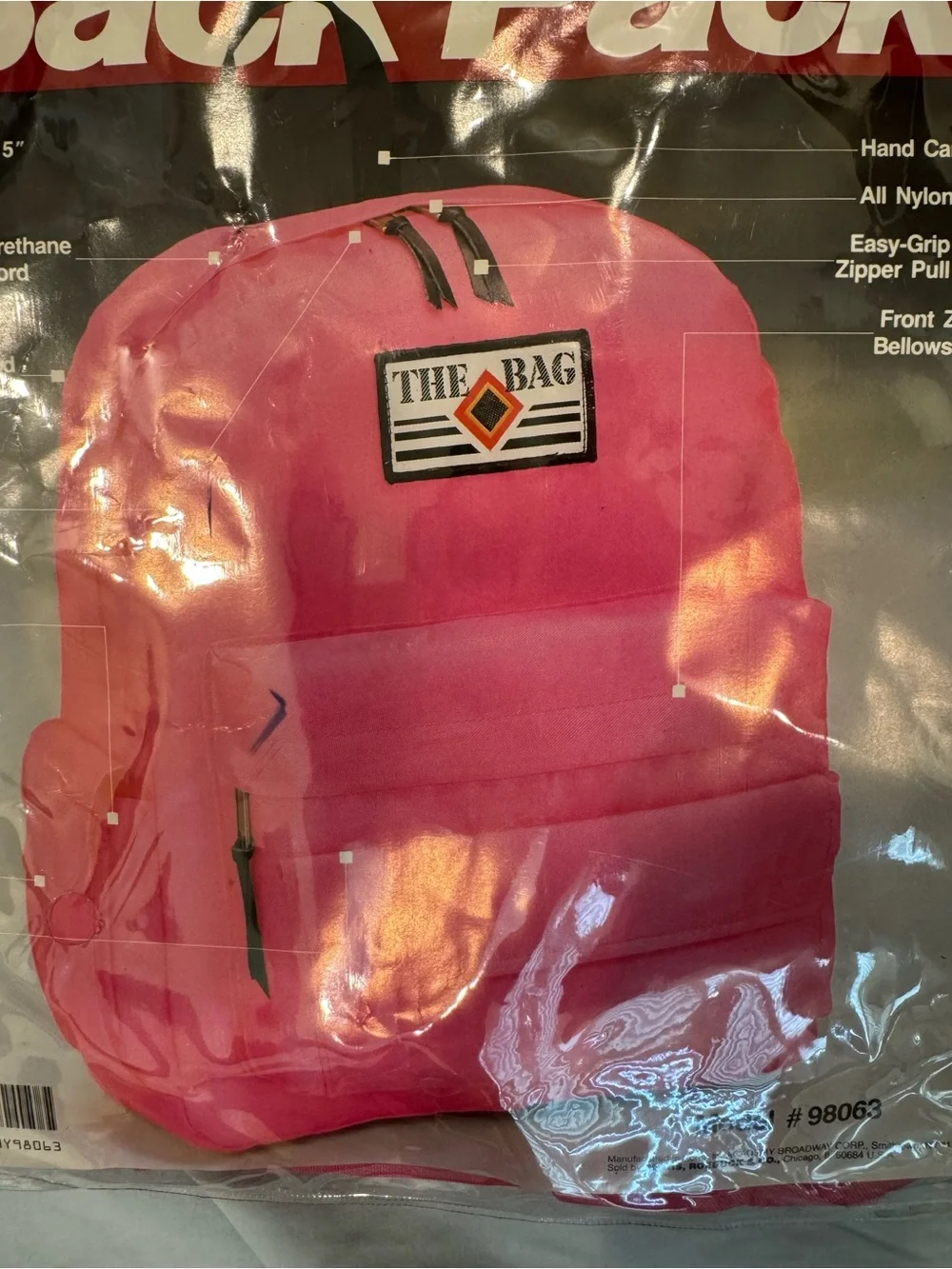 Vintage 1980s Sears “The Bag” backpack in bright pink, Model #98063.
